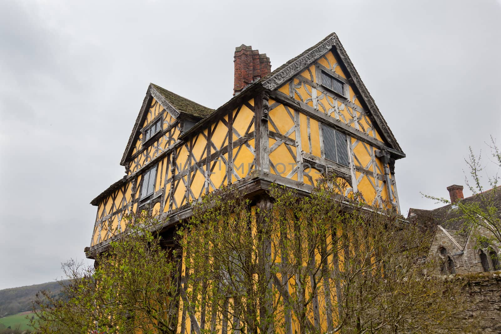 Gatehouse entrance to Stokesay castle on a dark cloudy day