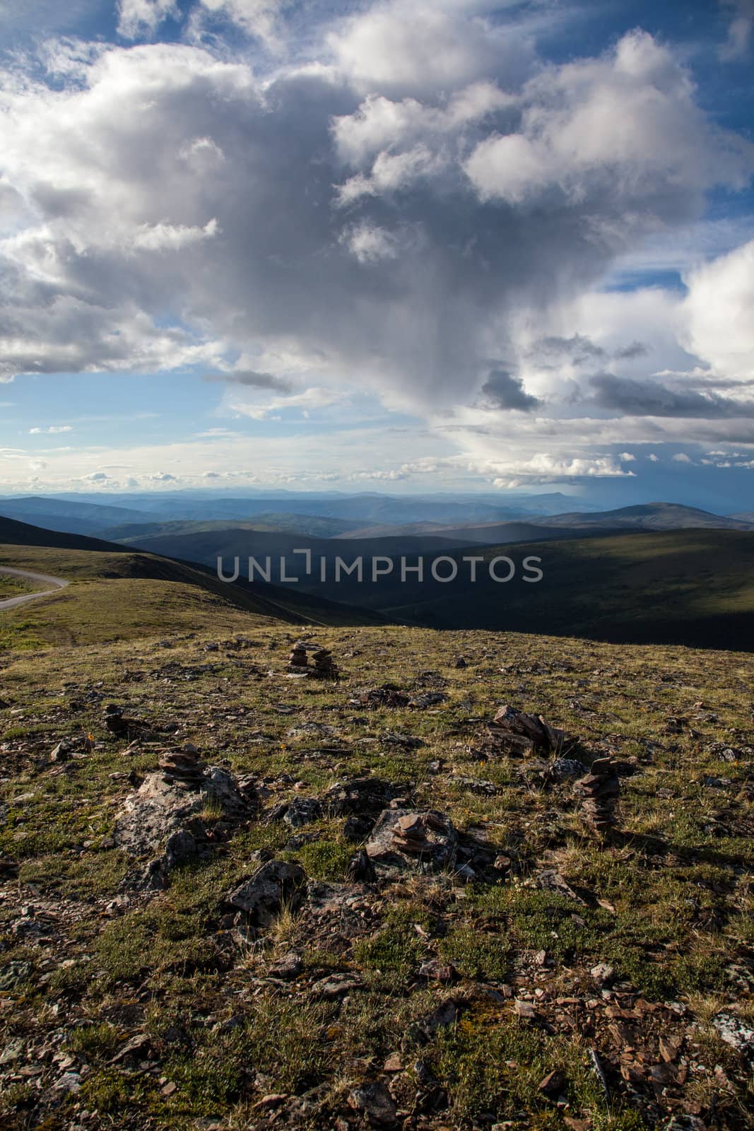 Rain storms hang over the high alpine tundra