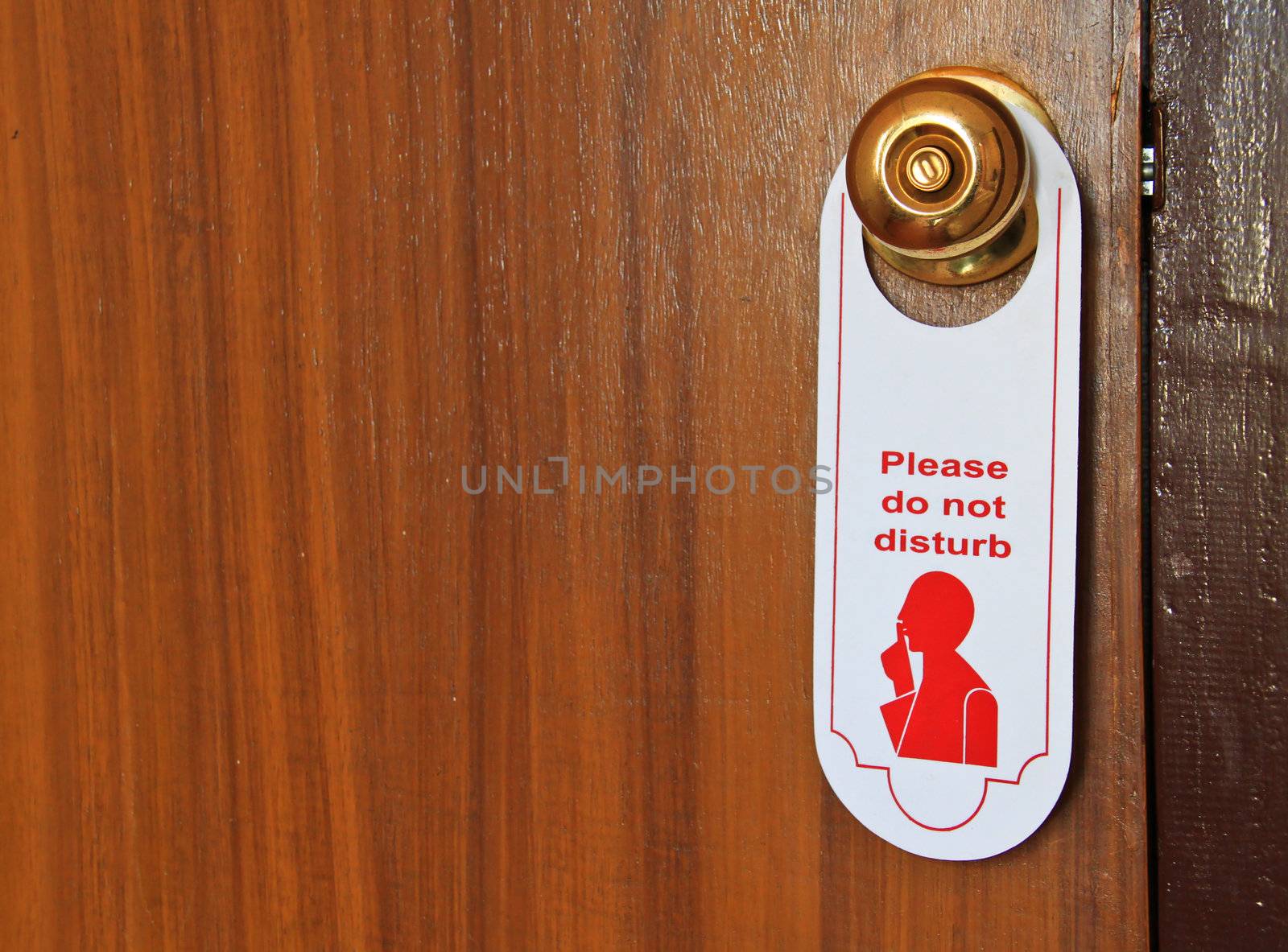 Please do not disturb hotel tag hanging on door knob