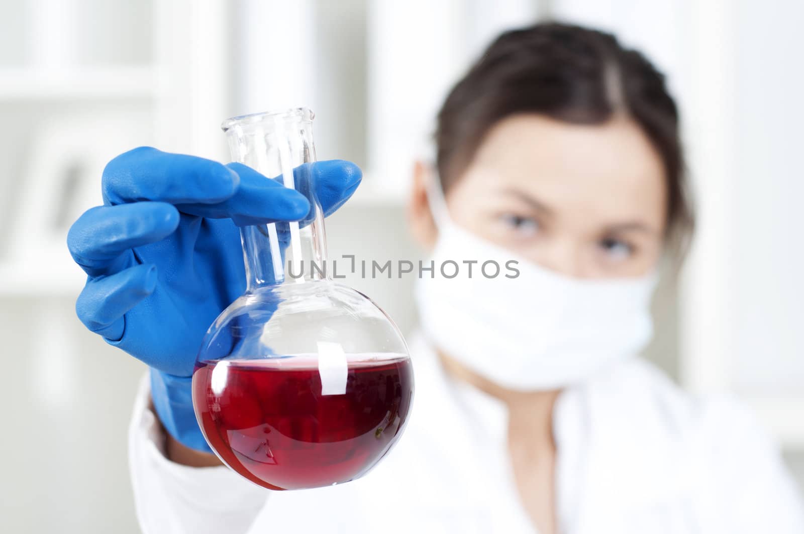 chemist working in laboratory with scientists equipment