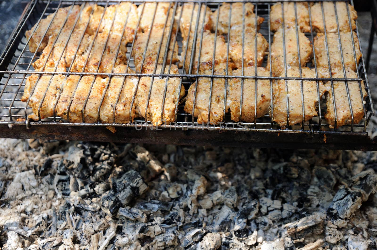 delicious barbeque with grid and coal