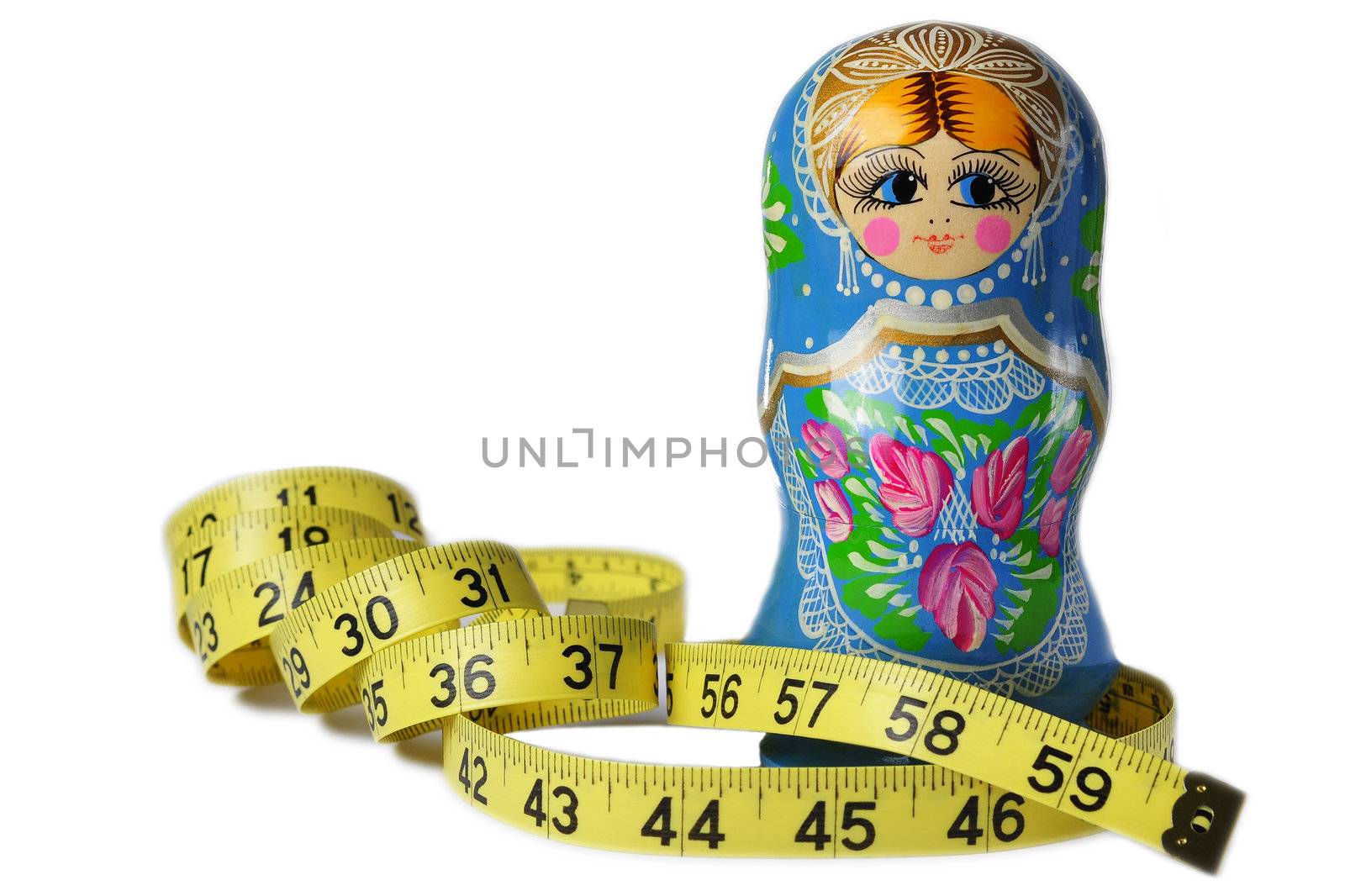 A thin Matrioska doll with a measuring tape around its waist