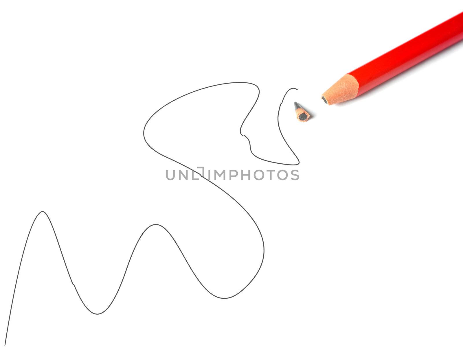 A broken pencil on a white piece of paper, with an erratic line drawn