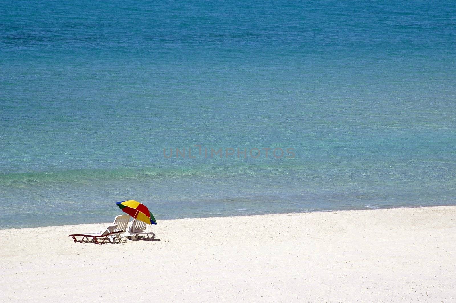 Sun chairs in a beach in Varadero, Cuba