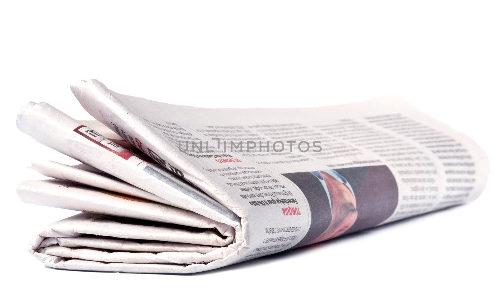 Closeup of a newspaper on a white background