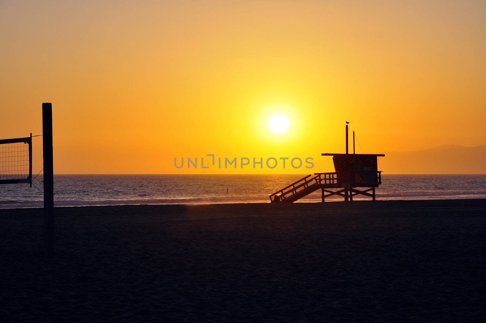 Lifeguard tower with sunset by ruigsantos