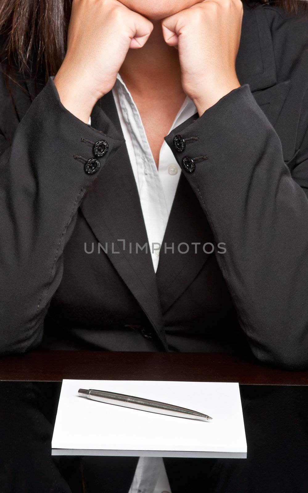 Bored businesswoman sitting at a table