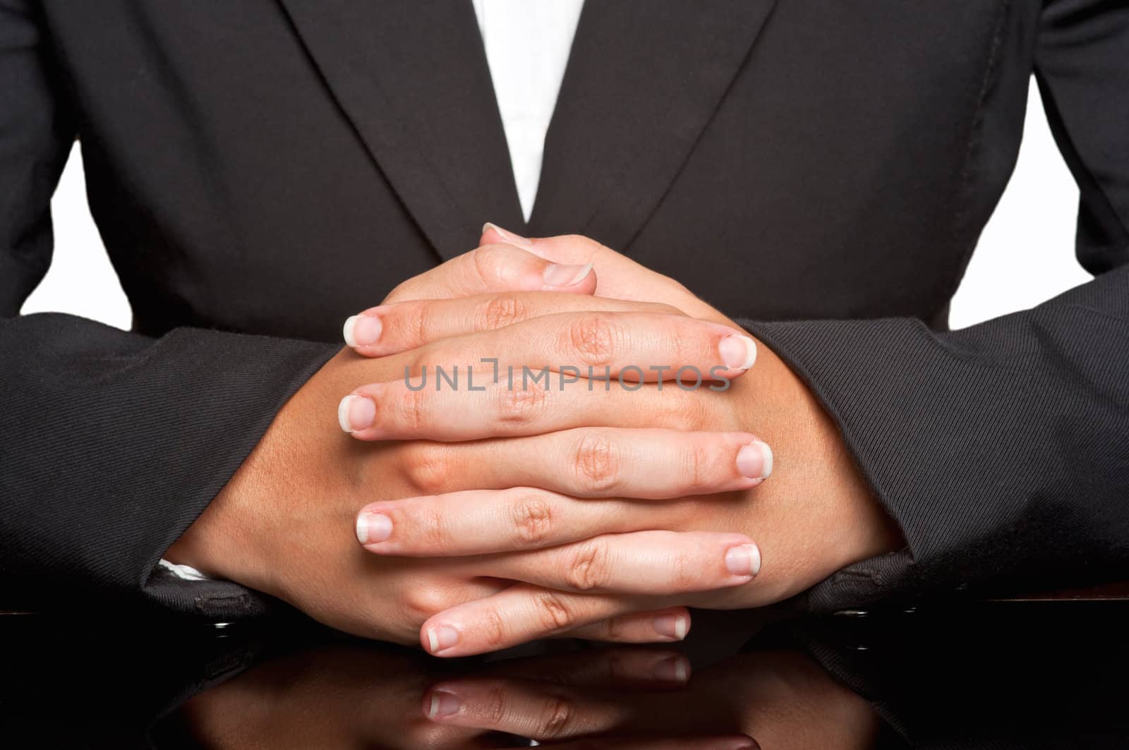 Business woman waiting with fingers crossed