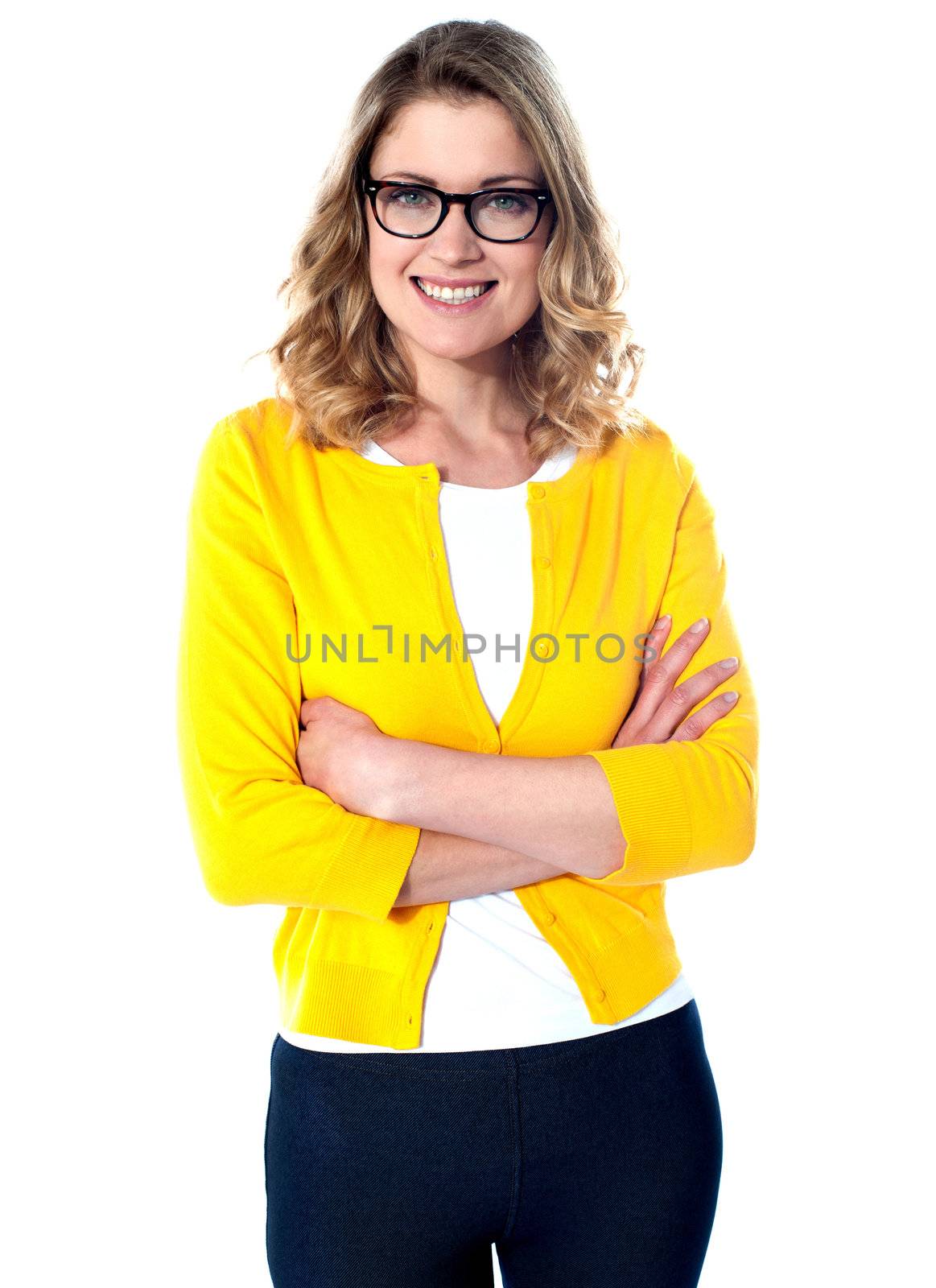 Pretty caucasian girl posing with arms crossed isolated on white