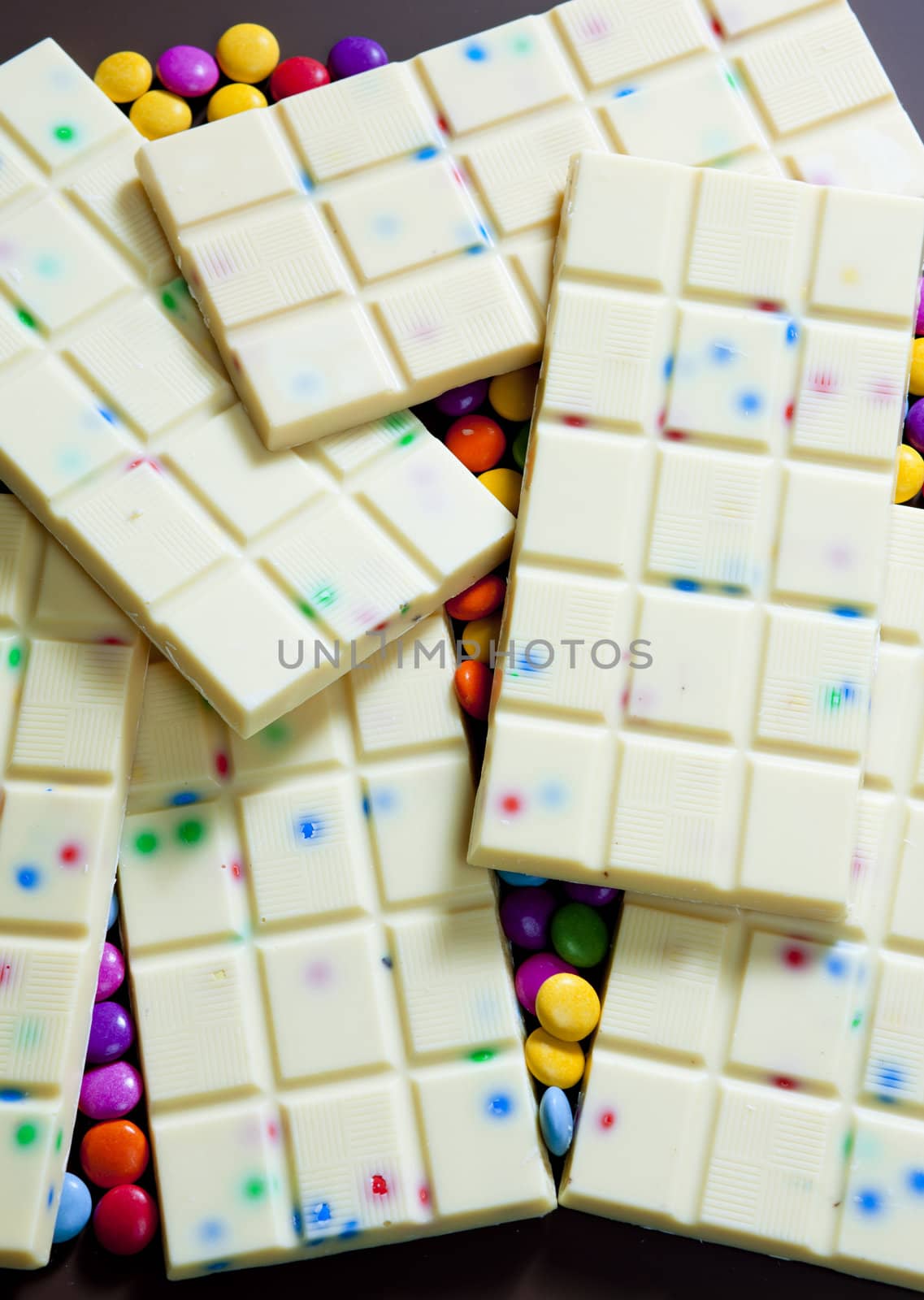 still life of white chocolate with smarties