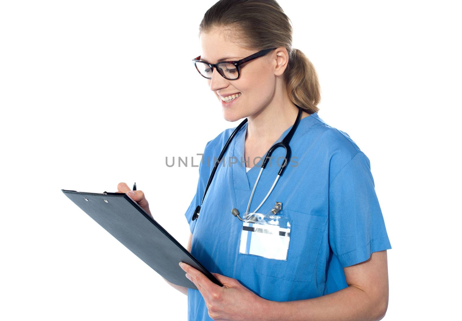 Female doctor holding a clipboard by stockyimages