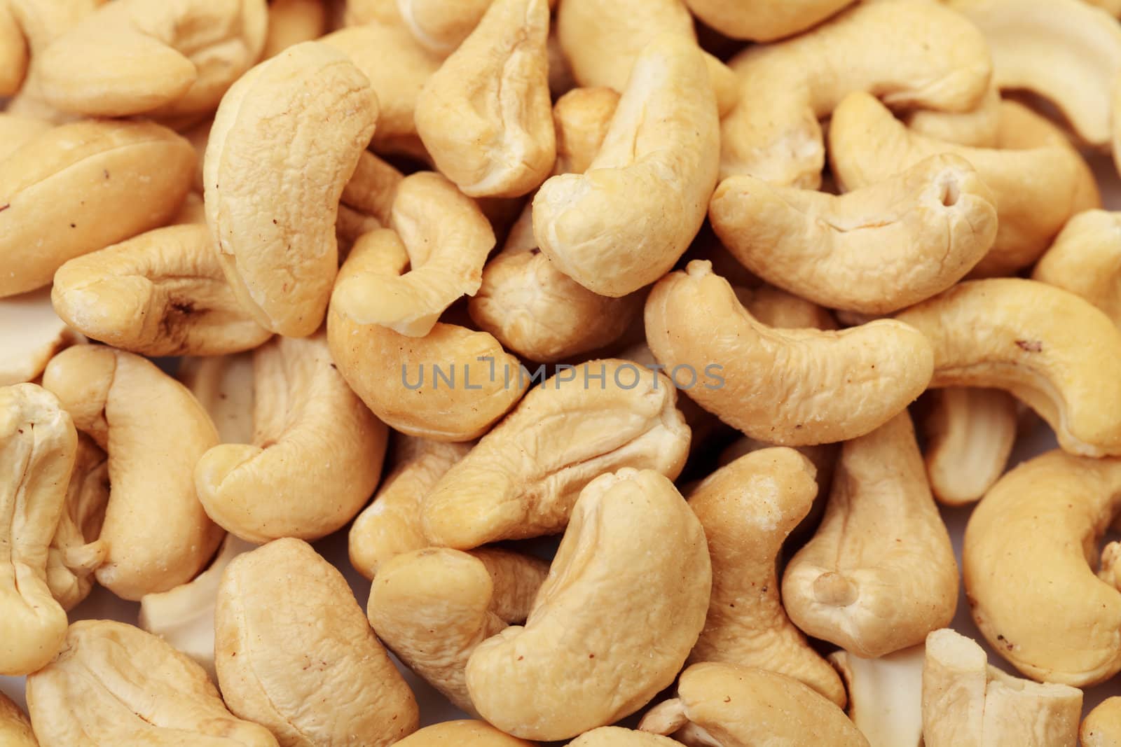 Ripe Cashew Nuts closeup on white background