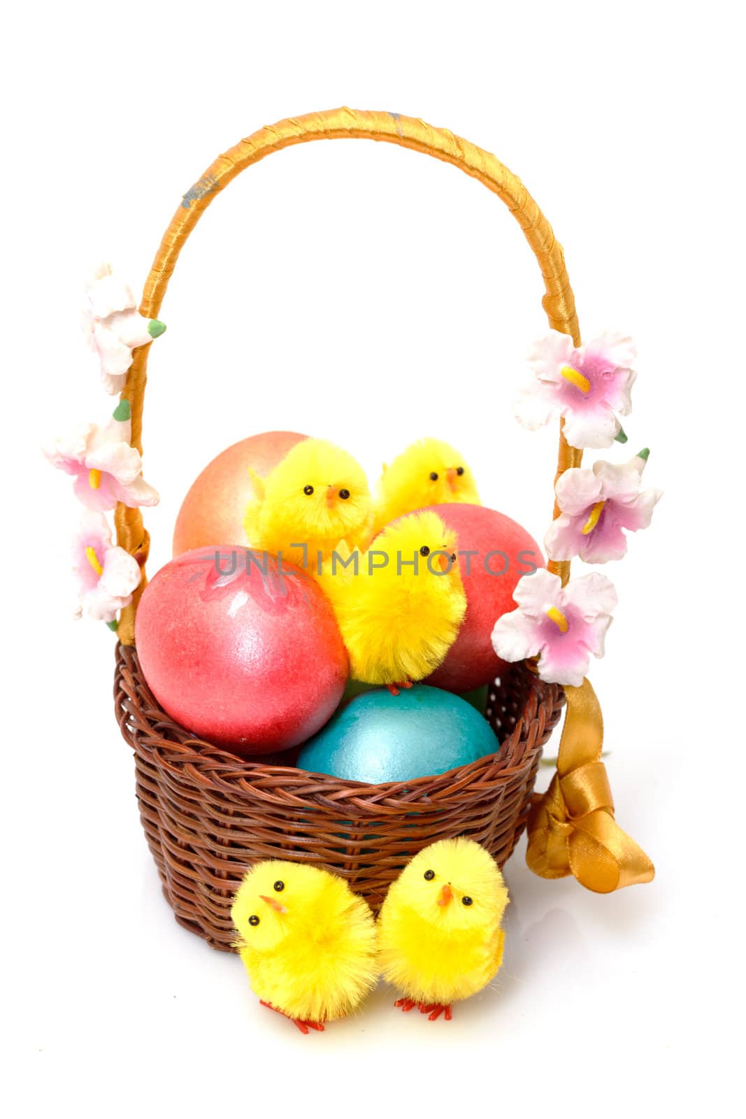 Basket with Easter Eggs on white background