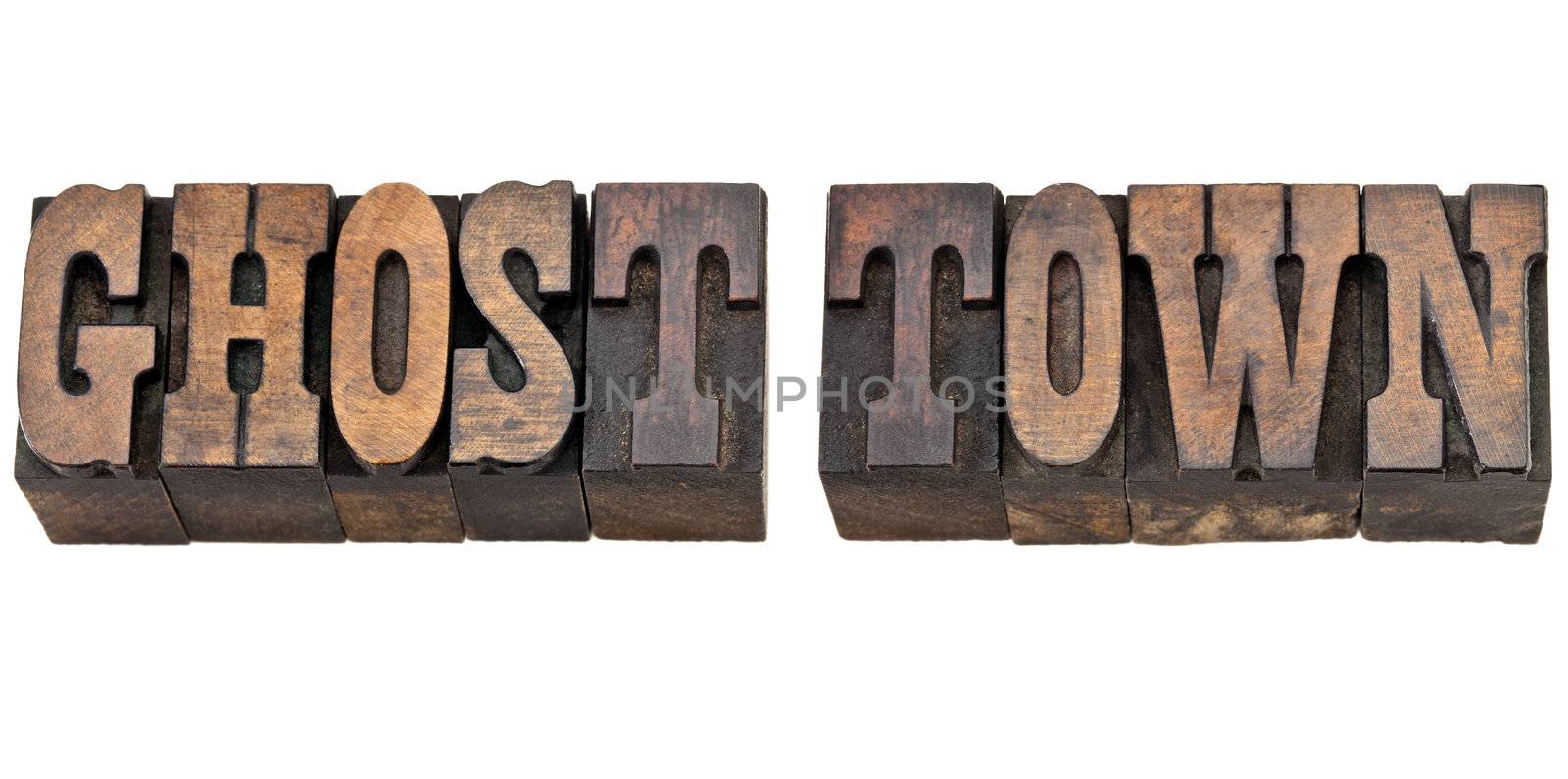 ghost town - isolated phrase in vintage letterpress wood type, French Clarendon font popular in western movies and memorabilia