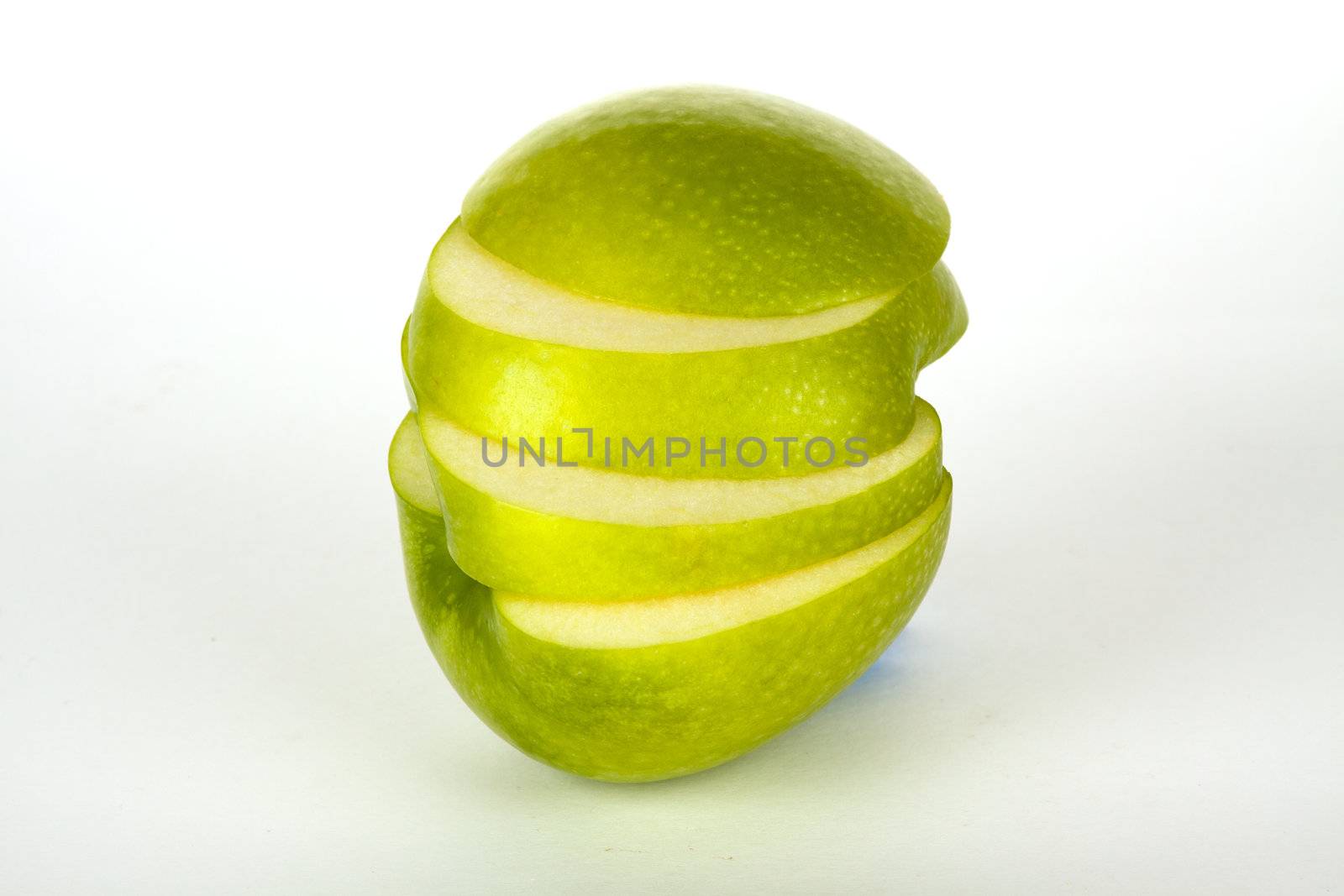 fresh green apple in four slices by juniart
