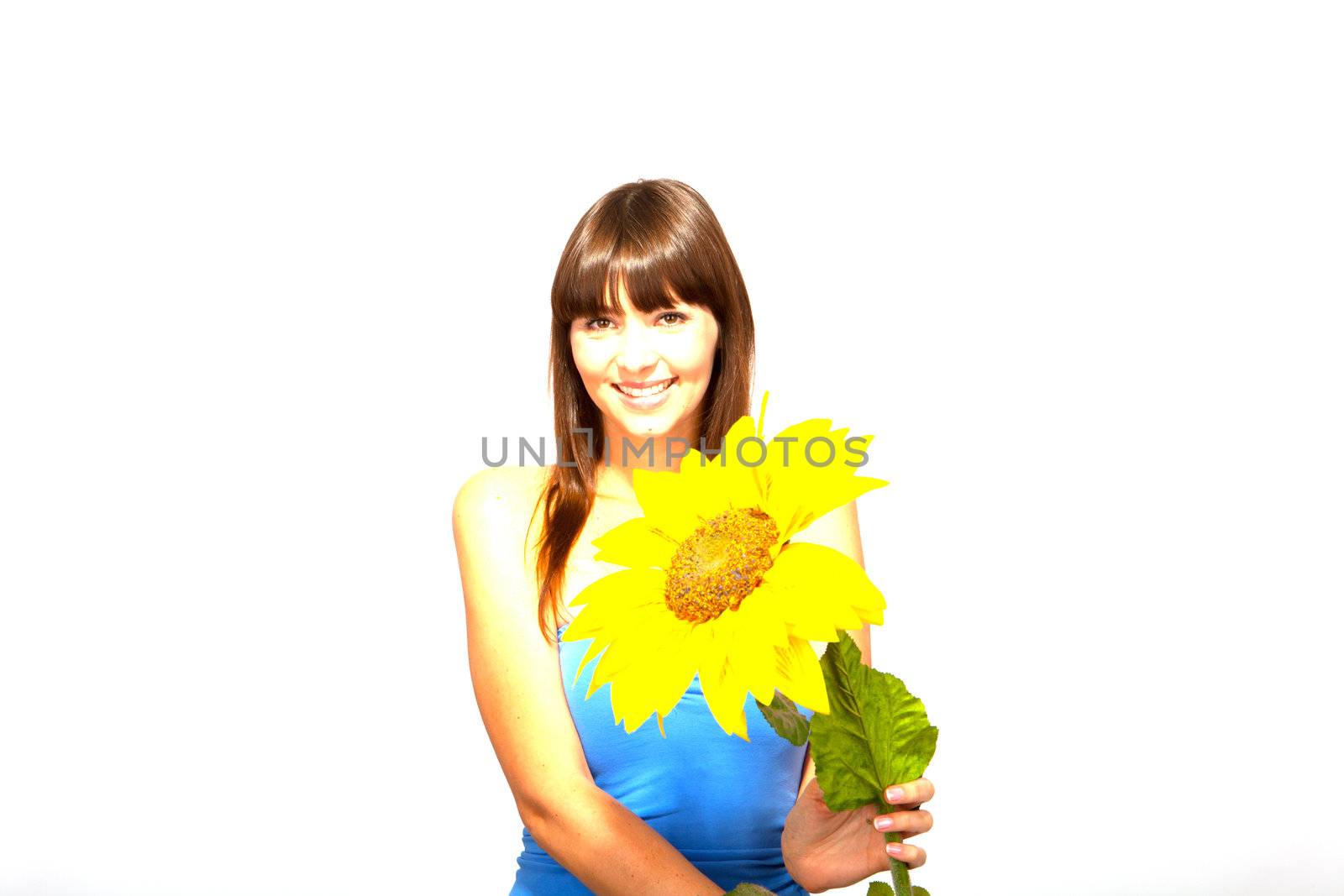 young beautiful brunette woman with a flower happy by juniart