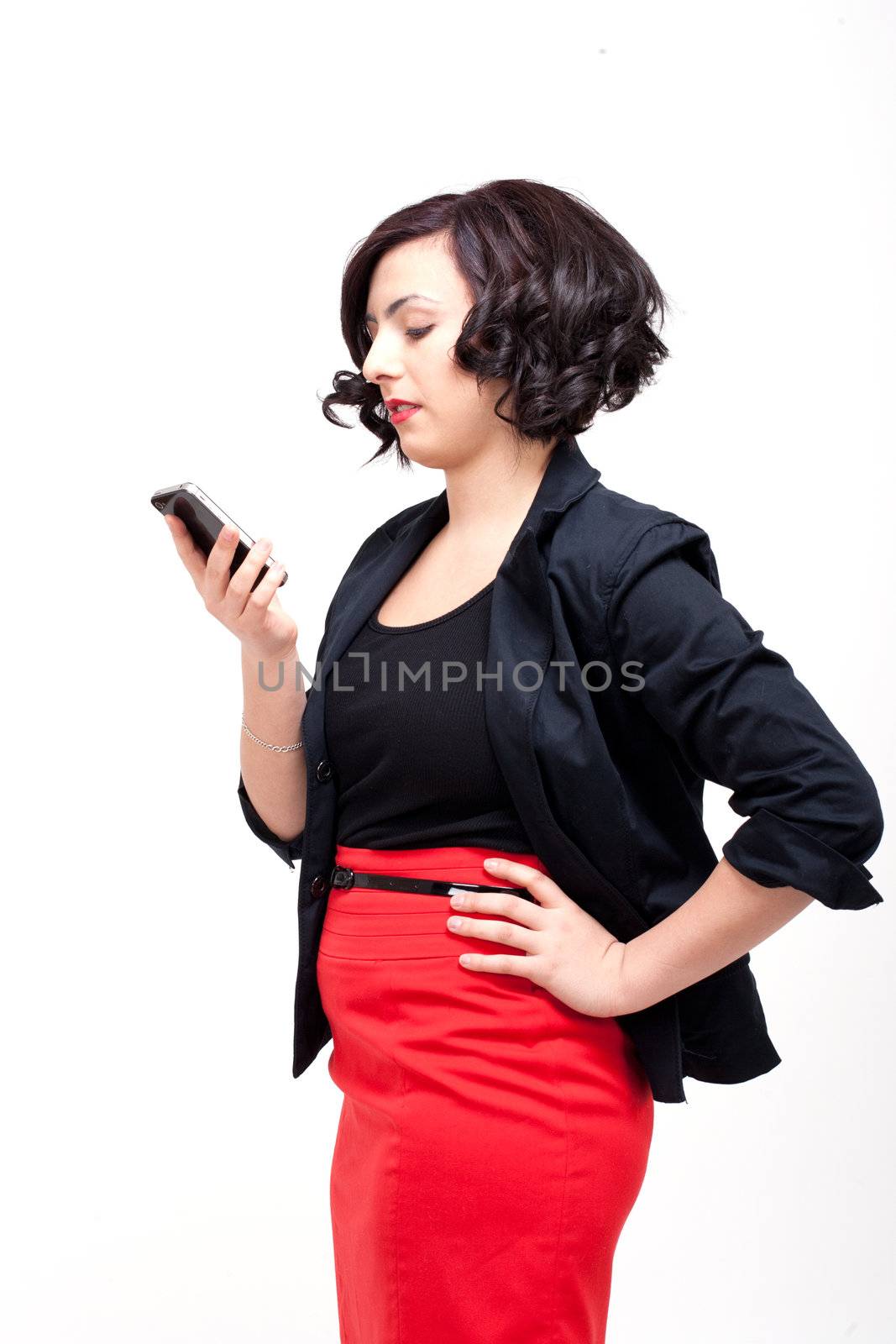 young business woman is talking on the mobile phone by juniart