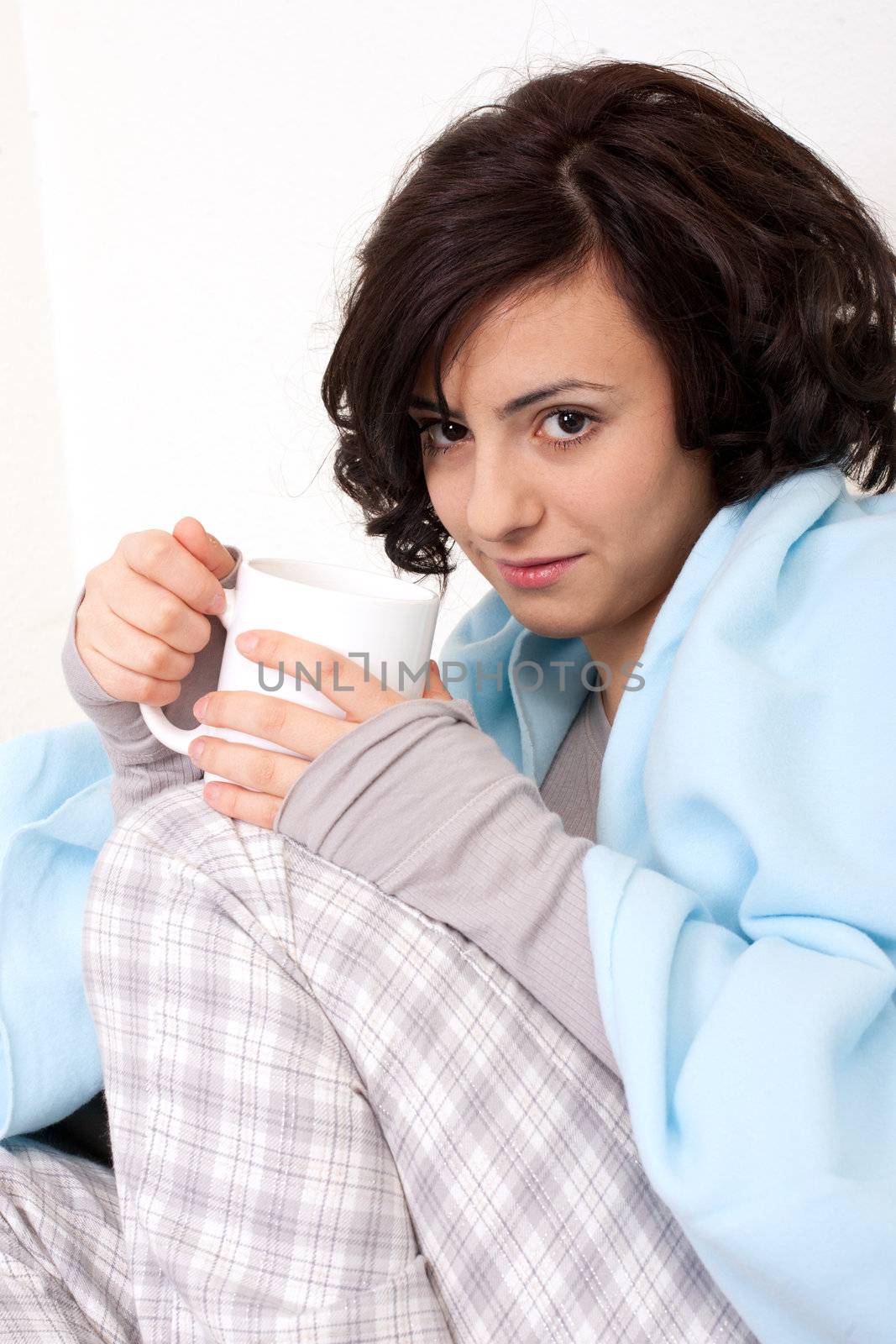 young beautiful girl with a cup of coffee