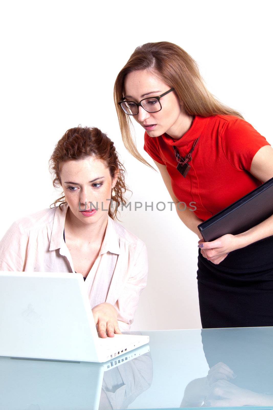 two business woman are discussing about a problem at work