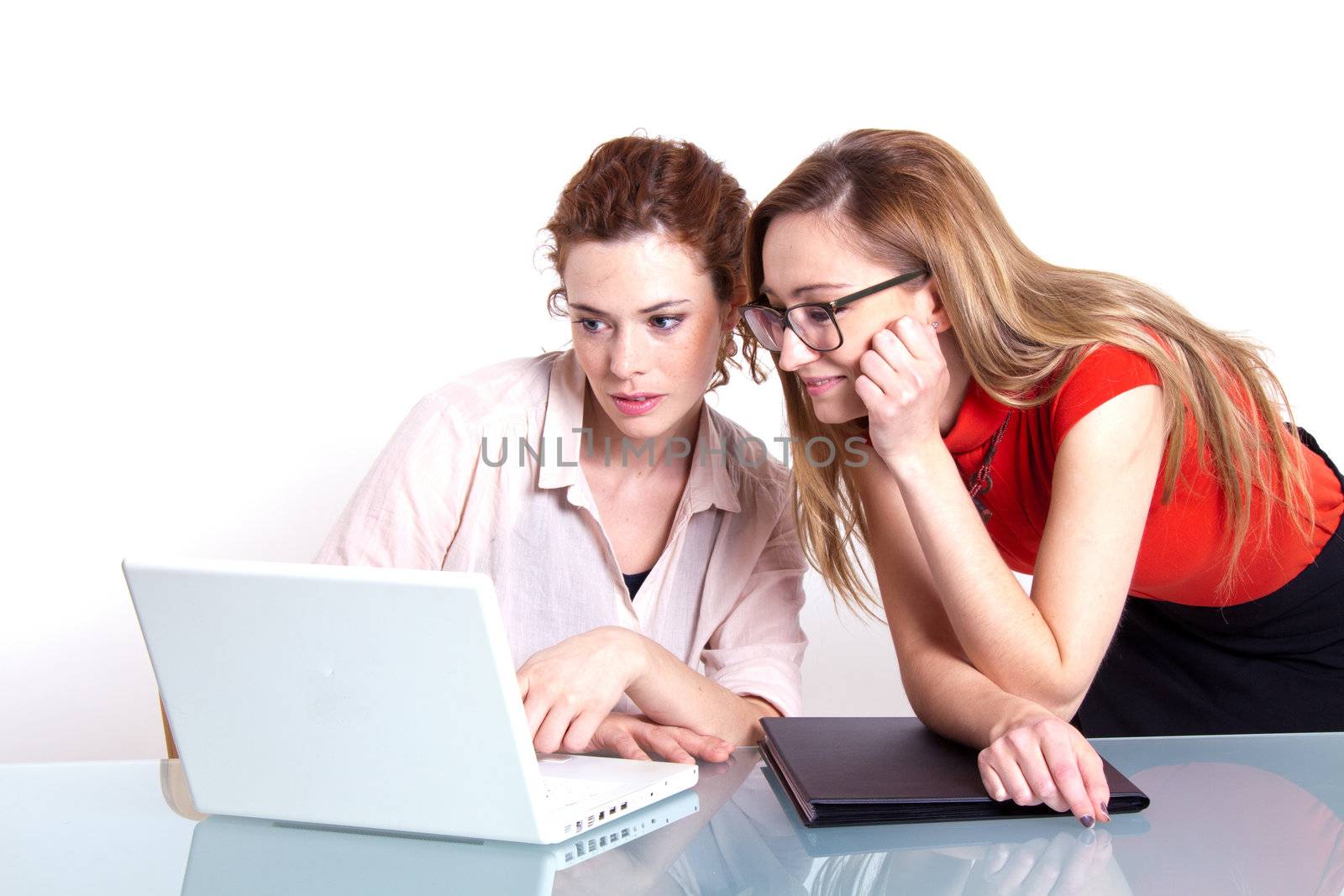 two business woman are discussing about a problem at work