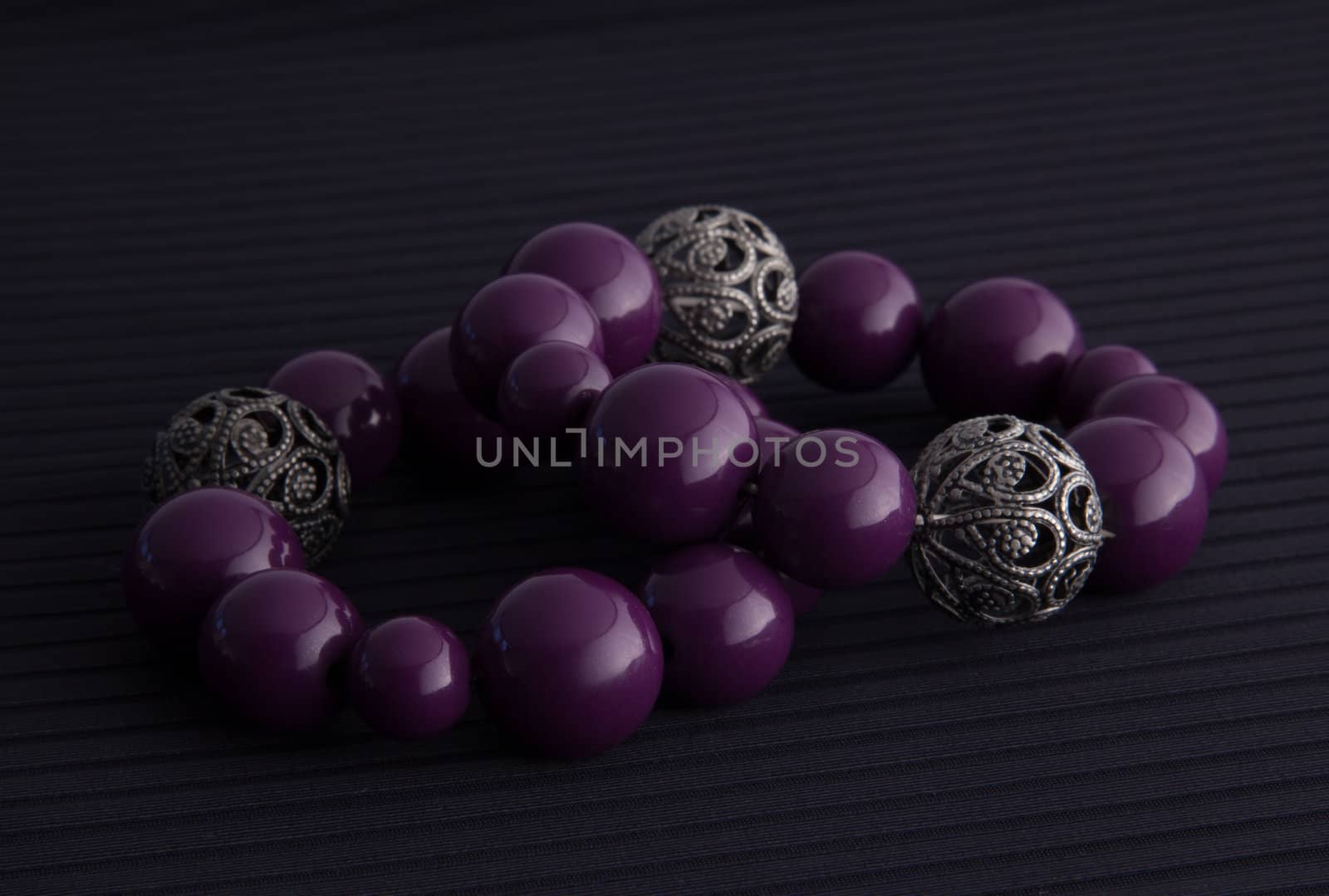 purple and silver bracelets