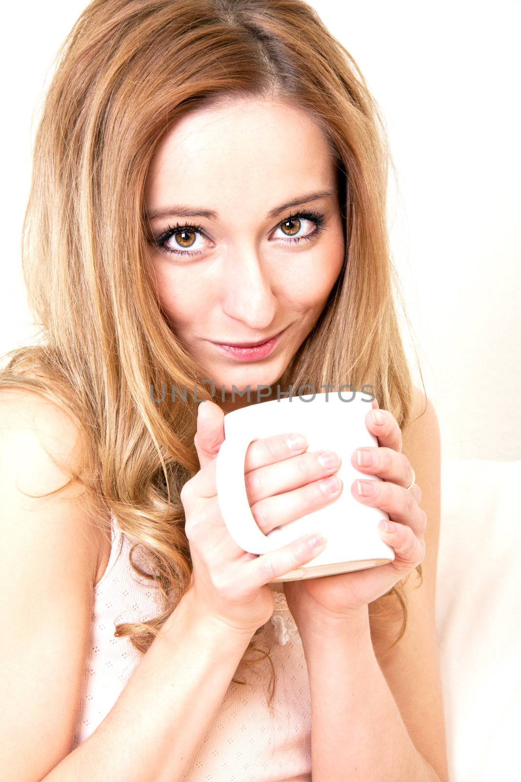 young beautiful girl with a cup of coffee