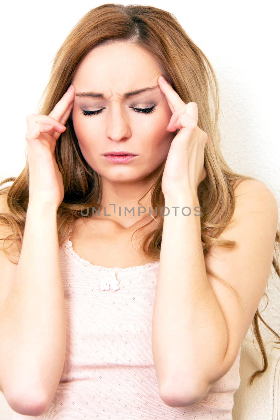 young beautiful woman with headache and a flu 