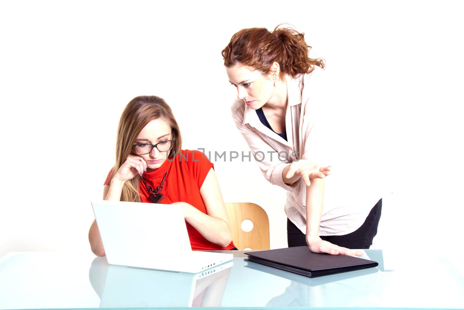 two business woman are discussing about a problem at work by juniart
