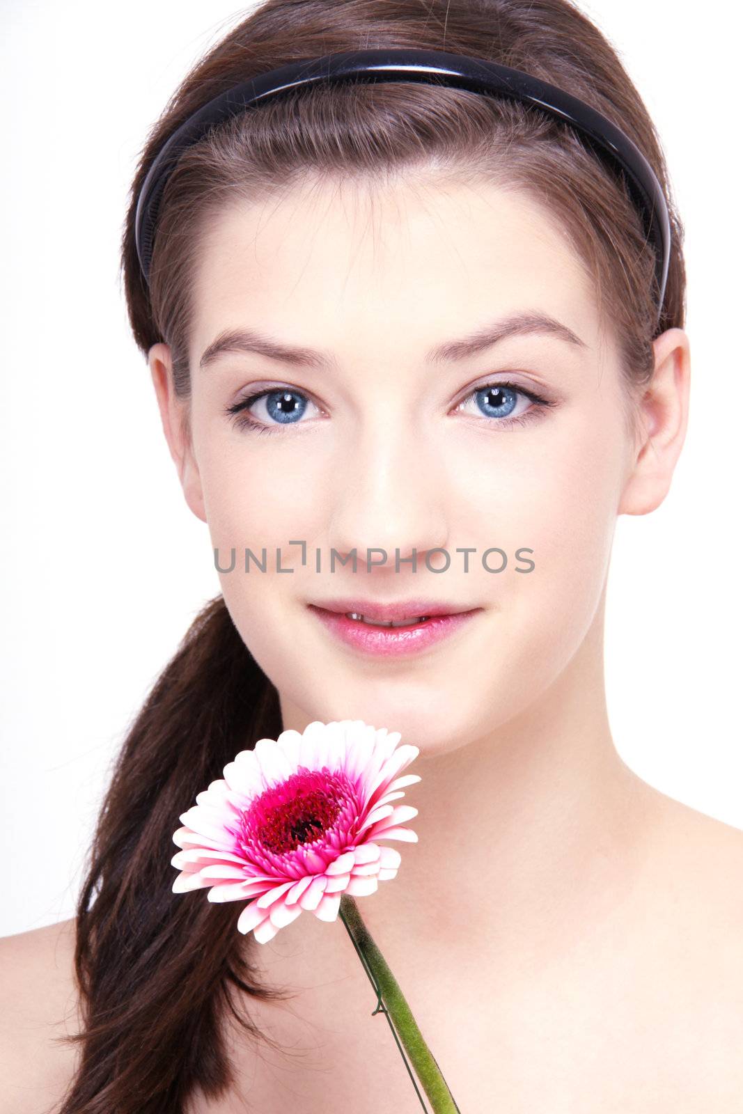young beautiful brunette woman with flower