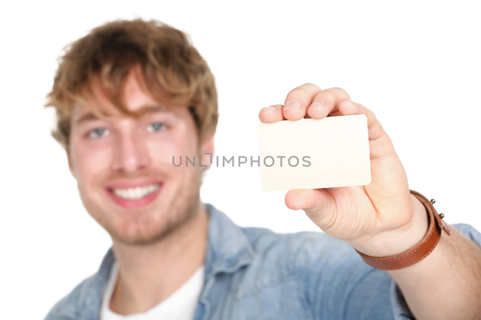 Business card man. Casual young man showing blank empty card sign. Young caucasian male model in his twenties.