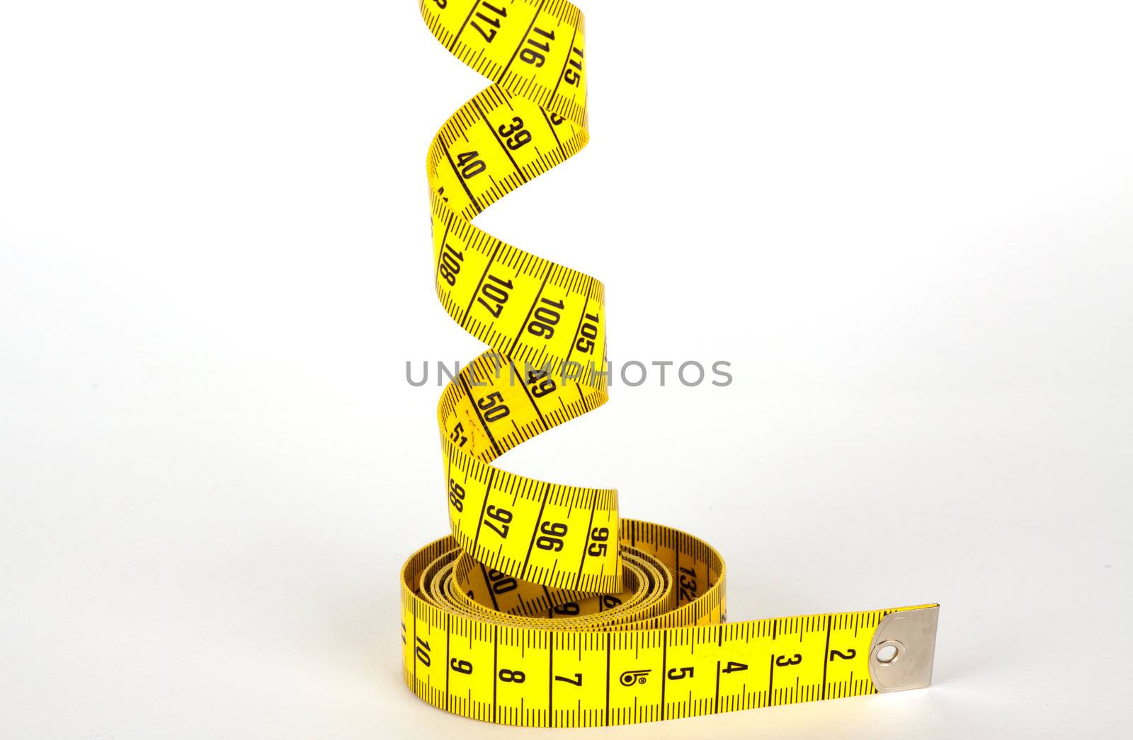yellow measure tape with scale in centimeters by juniart