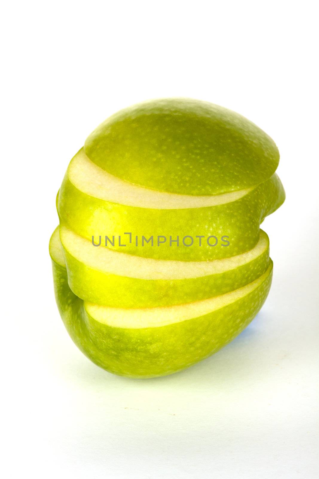 fresh green apple in four slices by juniart