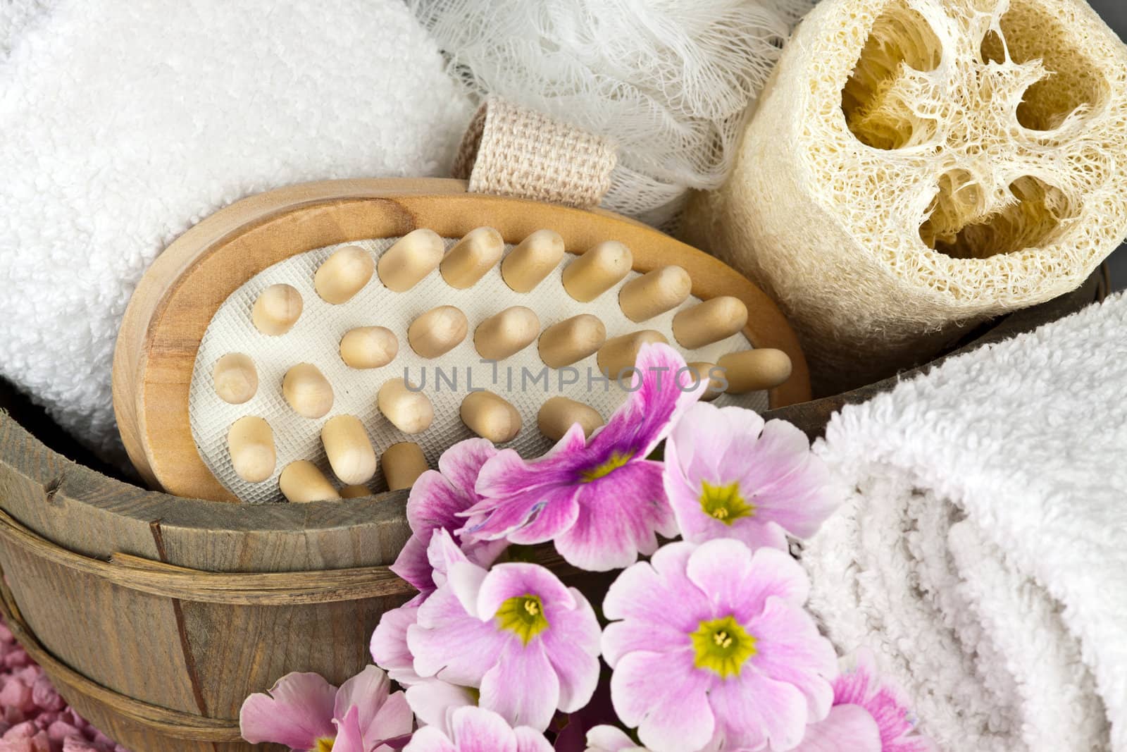 pink flowers brush and sponge for wellness in a beauty spa