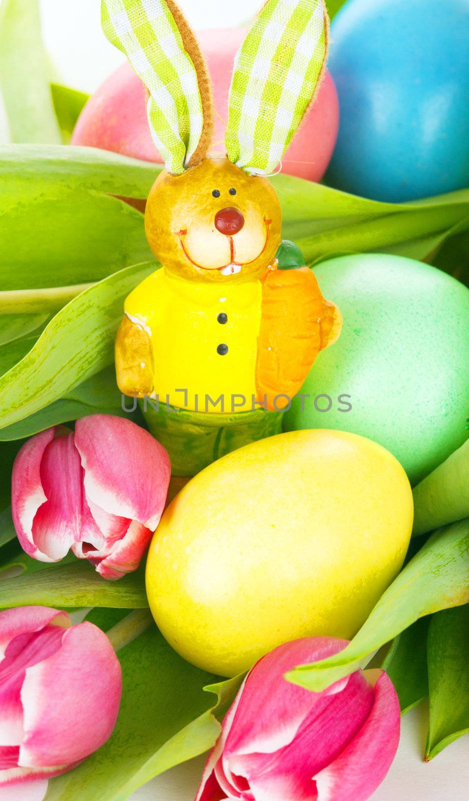 tulip wit eastern eggs a rabbit and letters in different colours by juniart