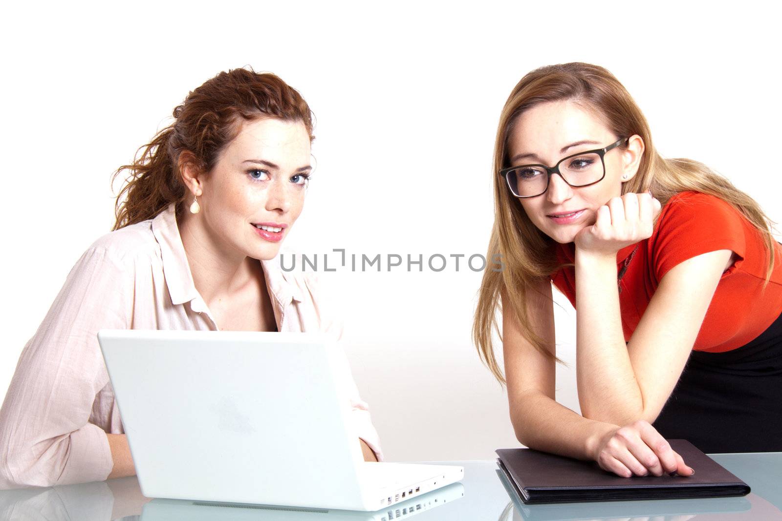 two business woman are discussing about a problem at work