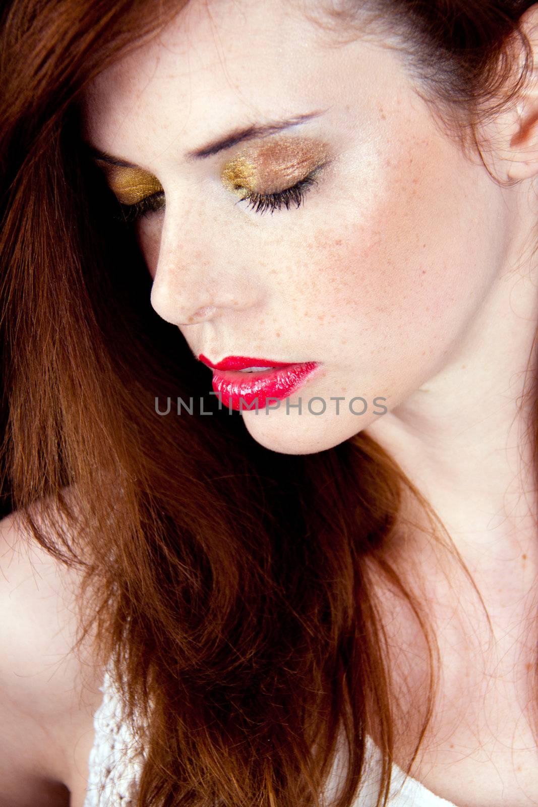 portrait of a beautiful young woman with red hair and red lips by juniart