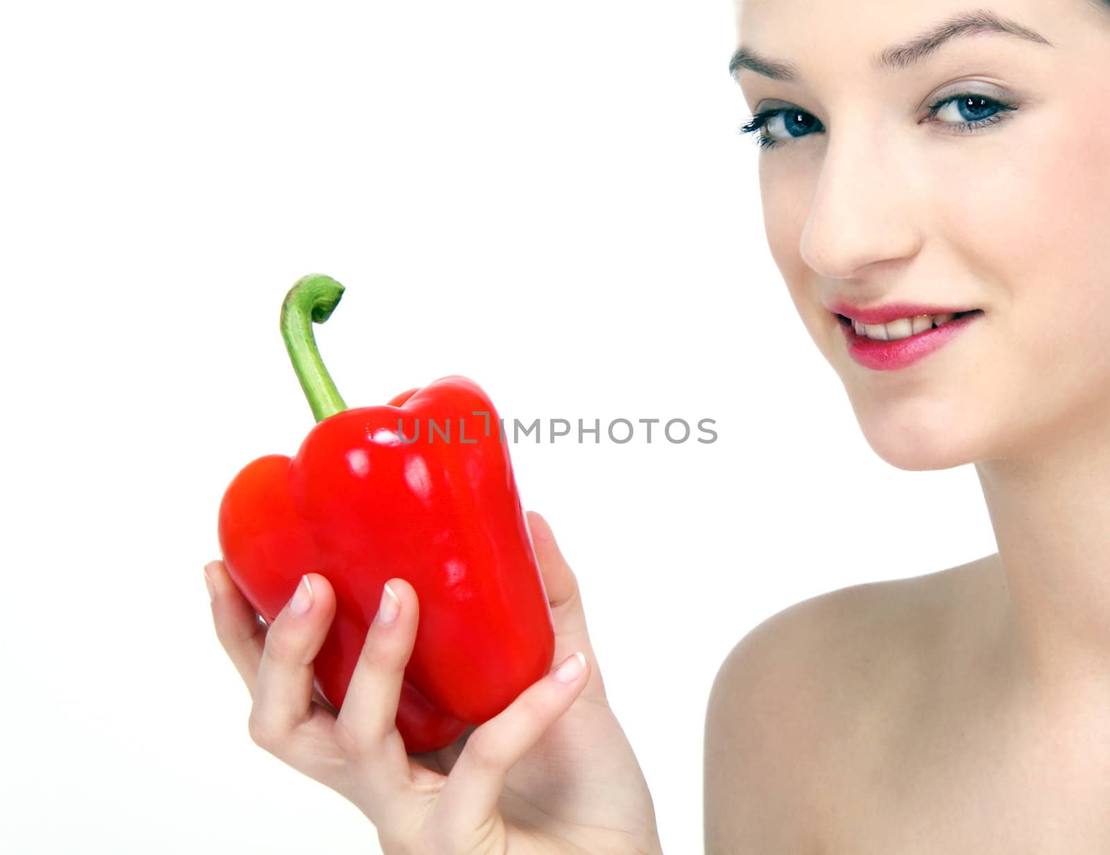 young beautiful girl with a red pepper in her hand by juniart