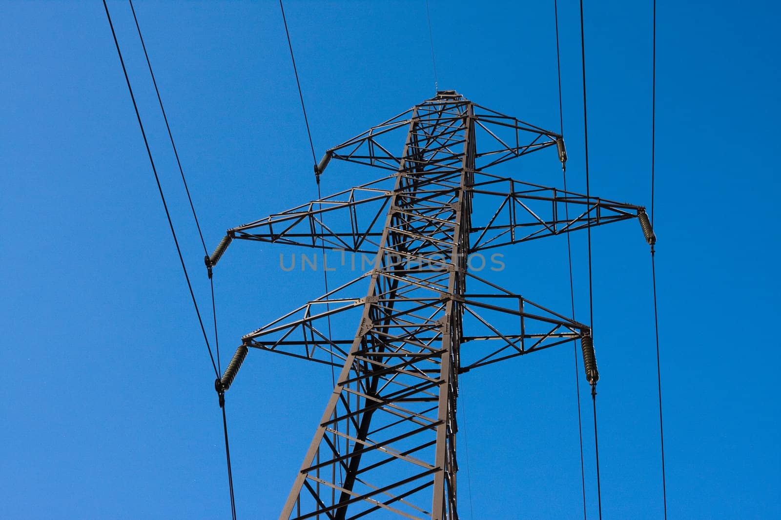 Transmission line on a background the blue sky