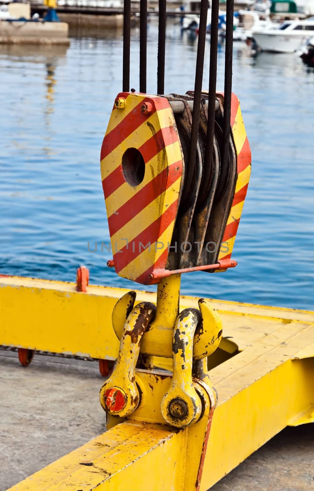 boat crane in marina wait some yachts 