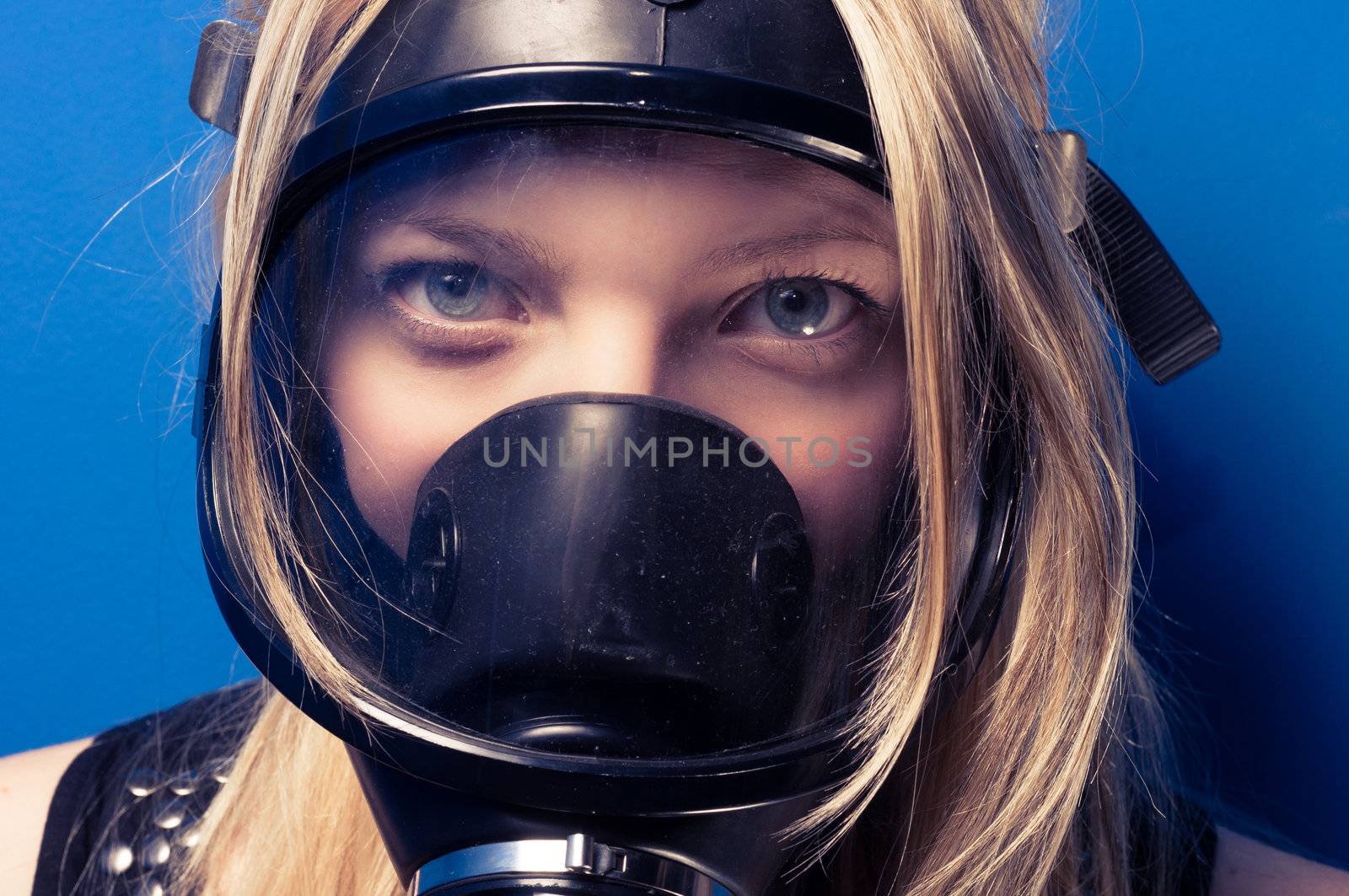 Young woman with a mask closeup