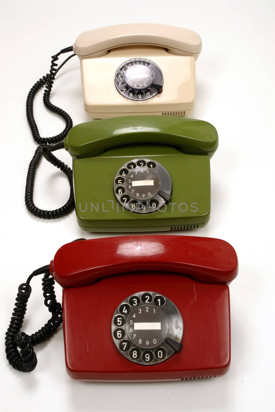 colourful retro phones symbolizing conference/teamwork/network............