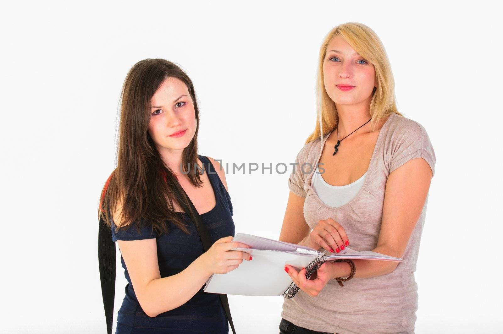 Two beautiful student girls getting ready for school isolated