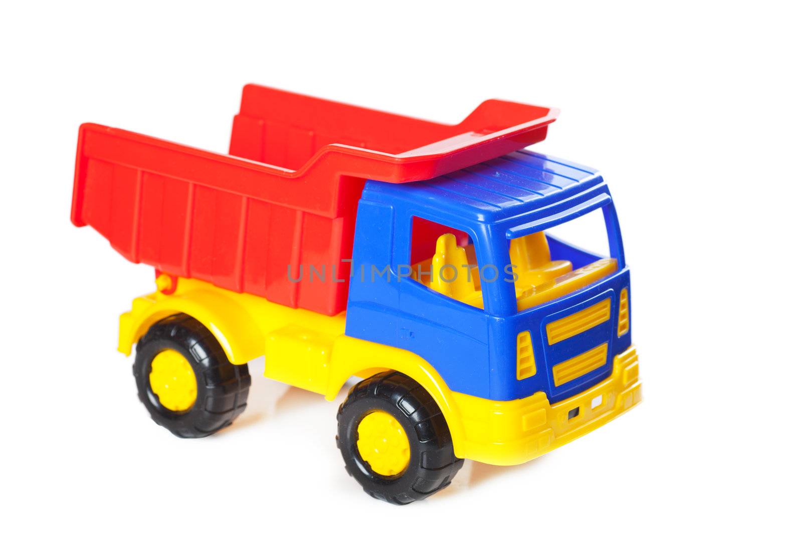 Colorful toy truck isolated over white background