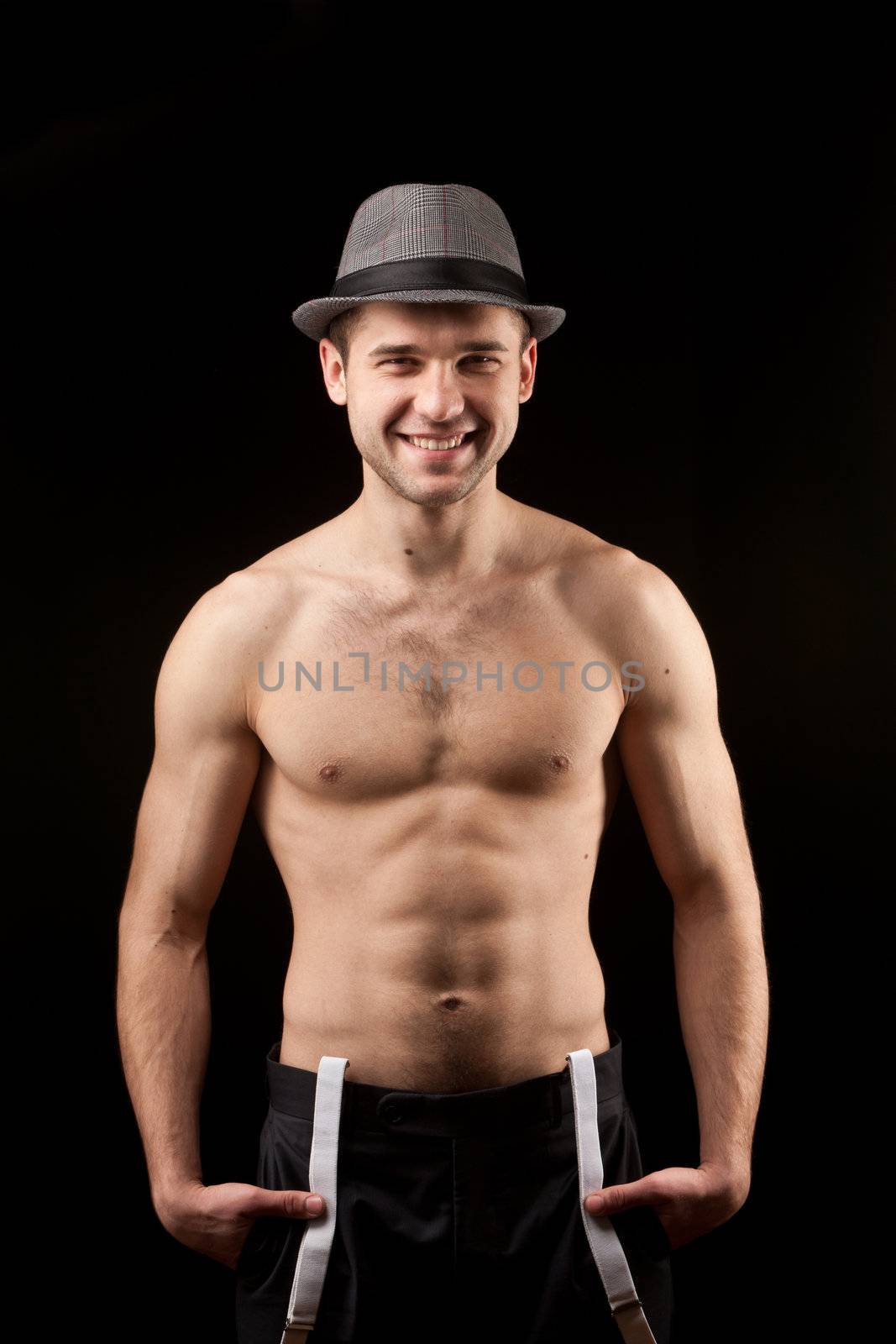 men in the hat on with suspenders over black