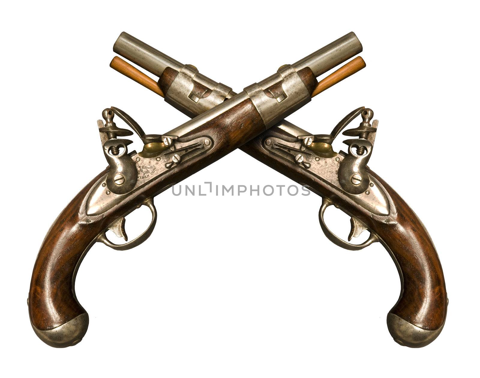 Two Crossed Flintlock Pistols against white background. Flintlock pistols manufactured by gunmaker Simeon North circa 1813, although it is similar to what was used during the American Revolution. It was one of the few flintlocks made in the United States in that era. It was also notable in that it had interchangeable parts.