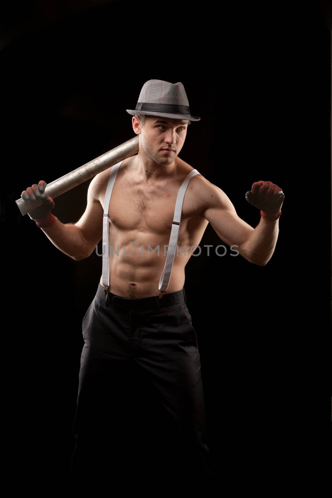 fighter in the hat on with suspenders over black