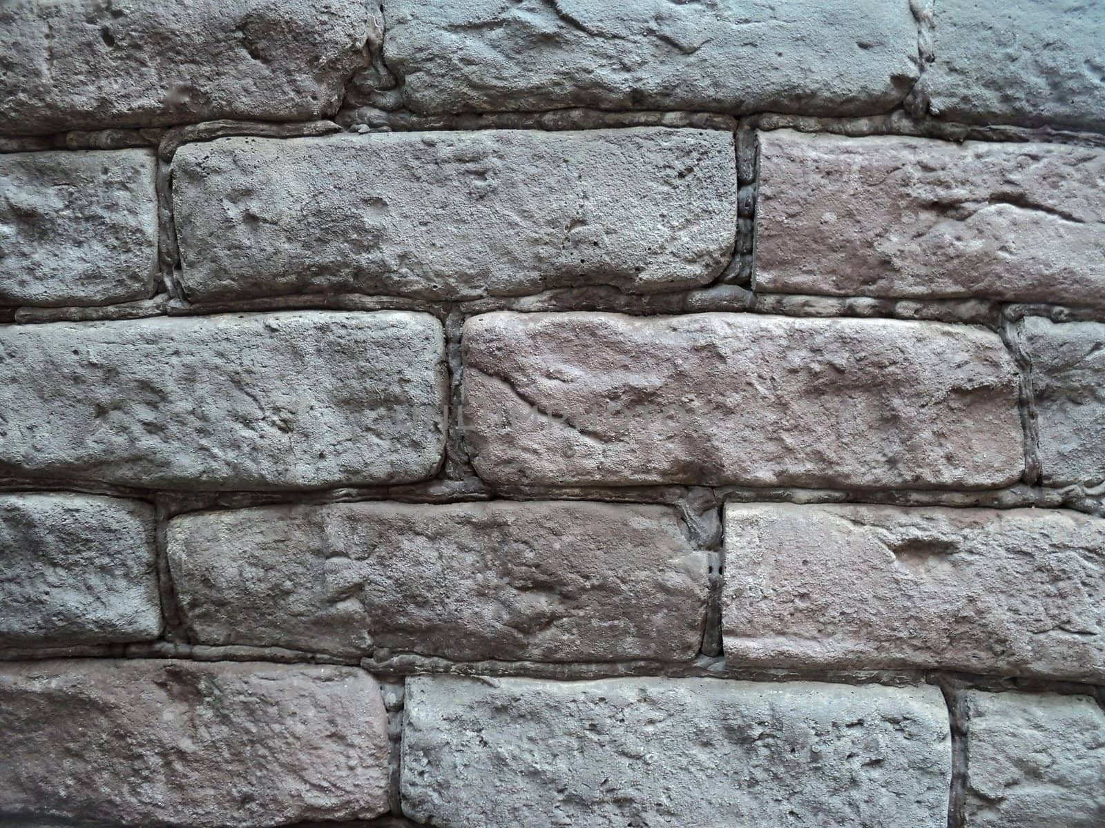 Structure of a fragment of the wall executed from a brick close up