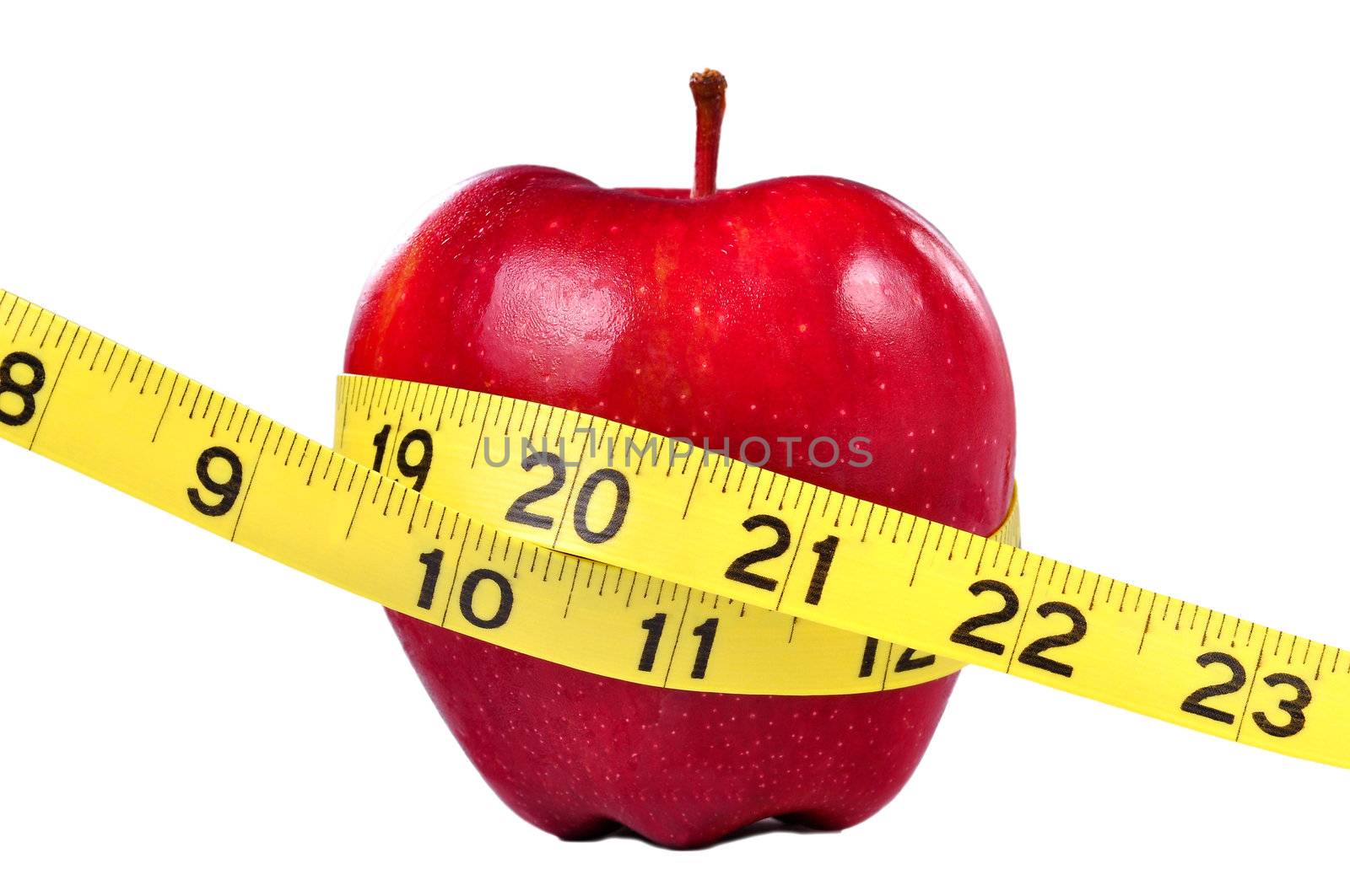 Red apple and yellow measuring tape to symbolize an healthy diet and body weight control.