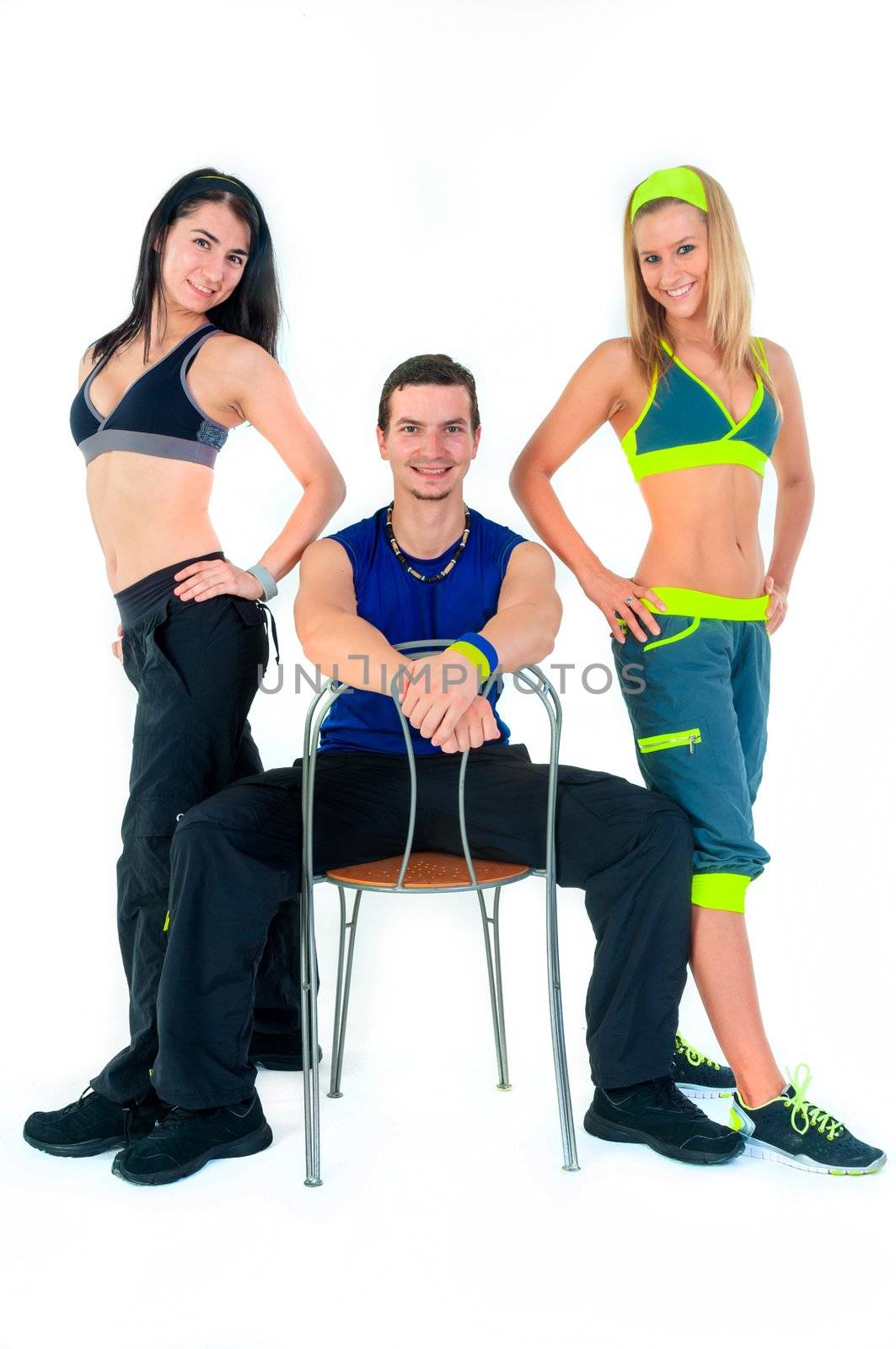 group of proud fitness instructors on white background