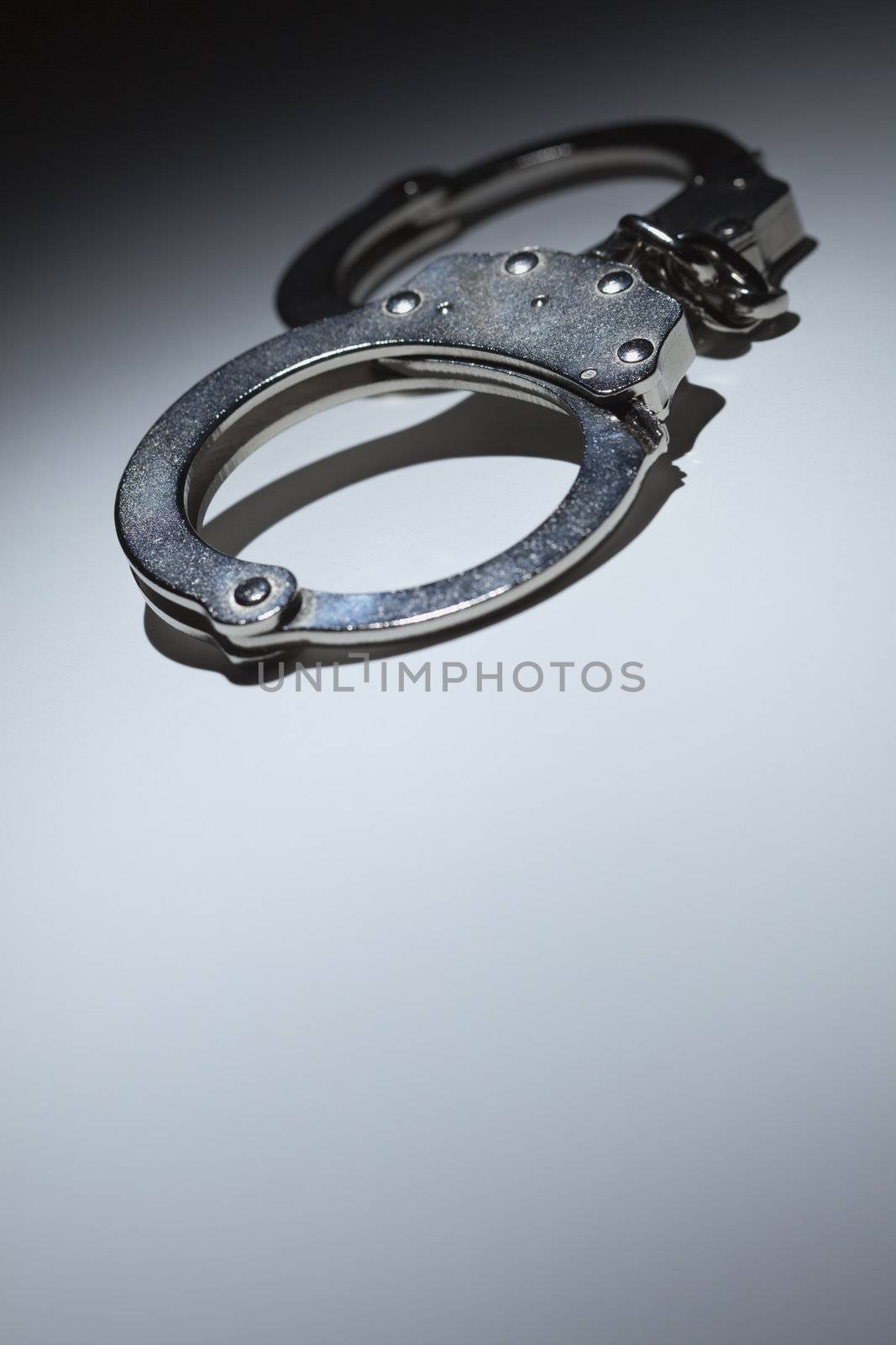 Abstract Pair of Handcuffs Under Spot Light - Text Room by Feverpitched